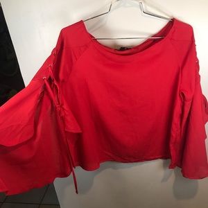 Red shirt with corset sleeves